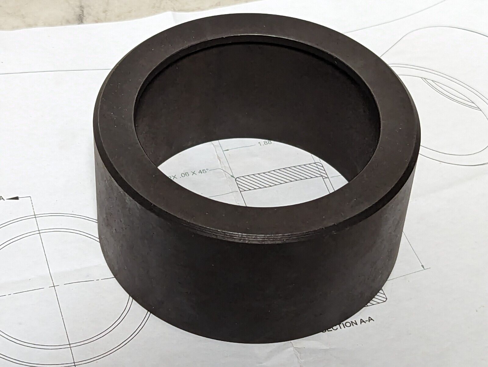 Bushing: 4 inch OD, 3 inch ID, 2 inches wide, 4140 prehard, RC45-50 heat treat, 