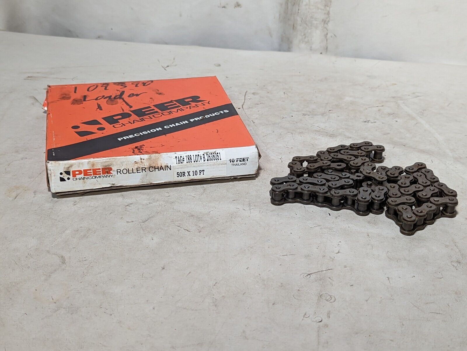 Lot of two boxes of Peer 50R roller chain, 1 10ft box, 1 shorter box as pictured